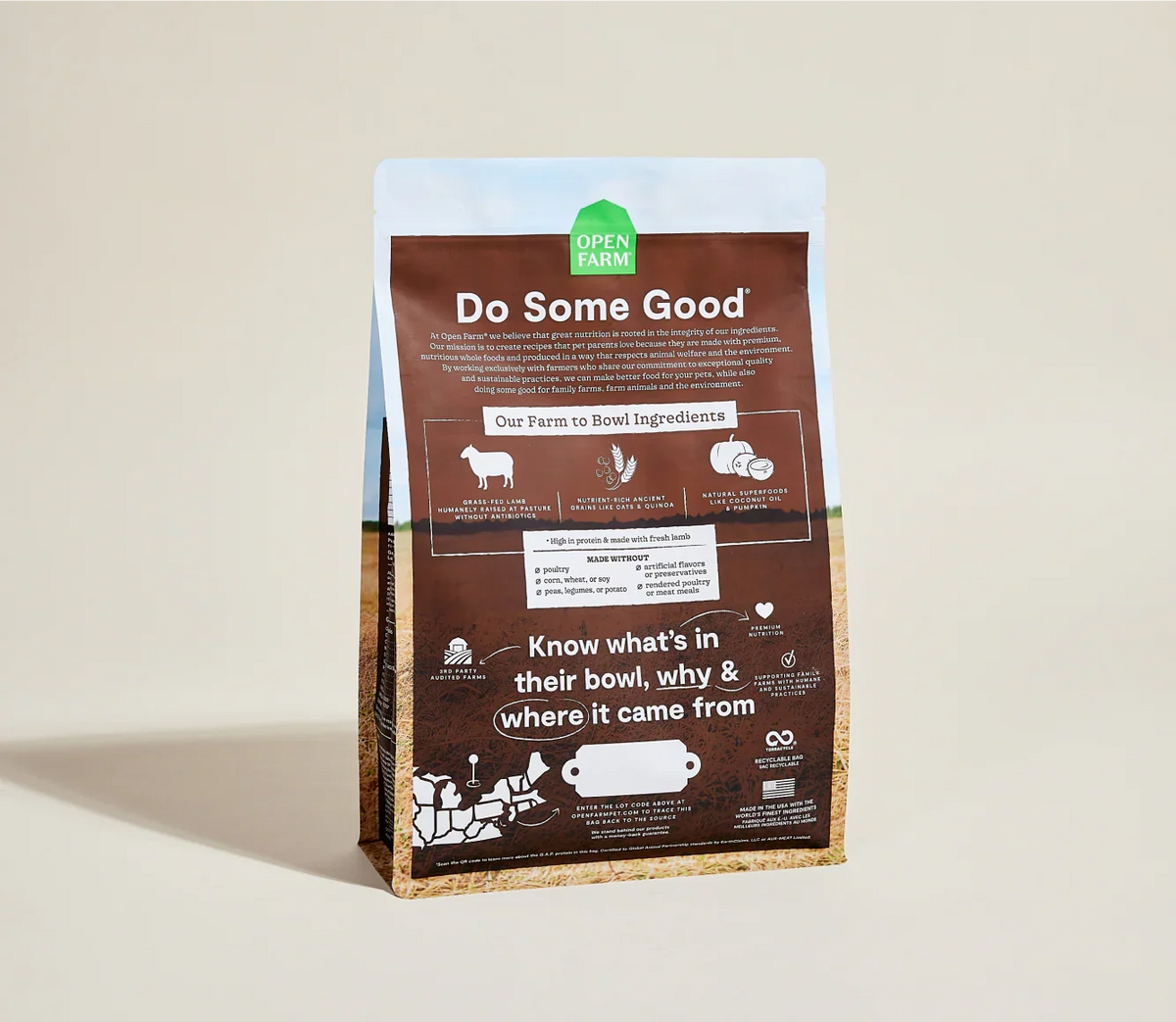 Back of the Open Farm lamb & ancient grains dog food bag with ingredient sourcing and traceability details